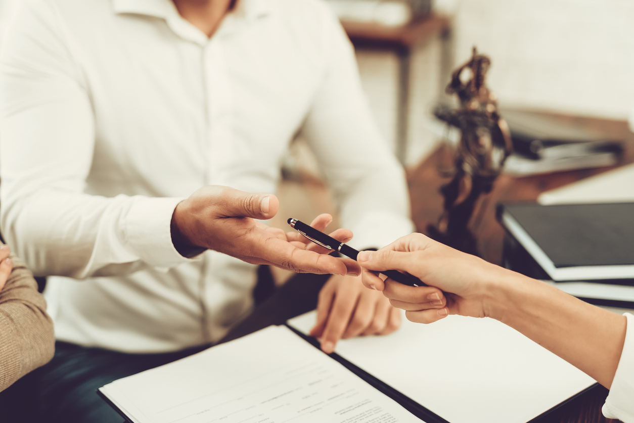 Notary public notarising a document