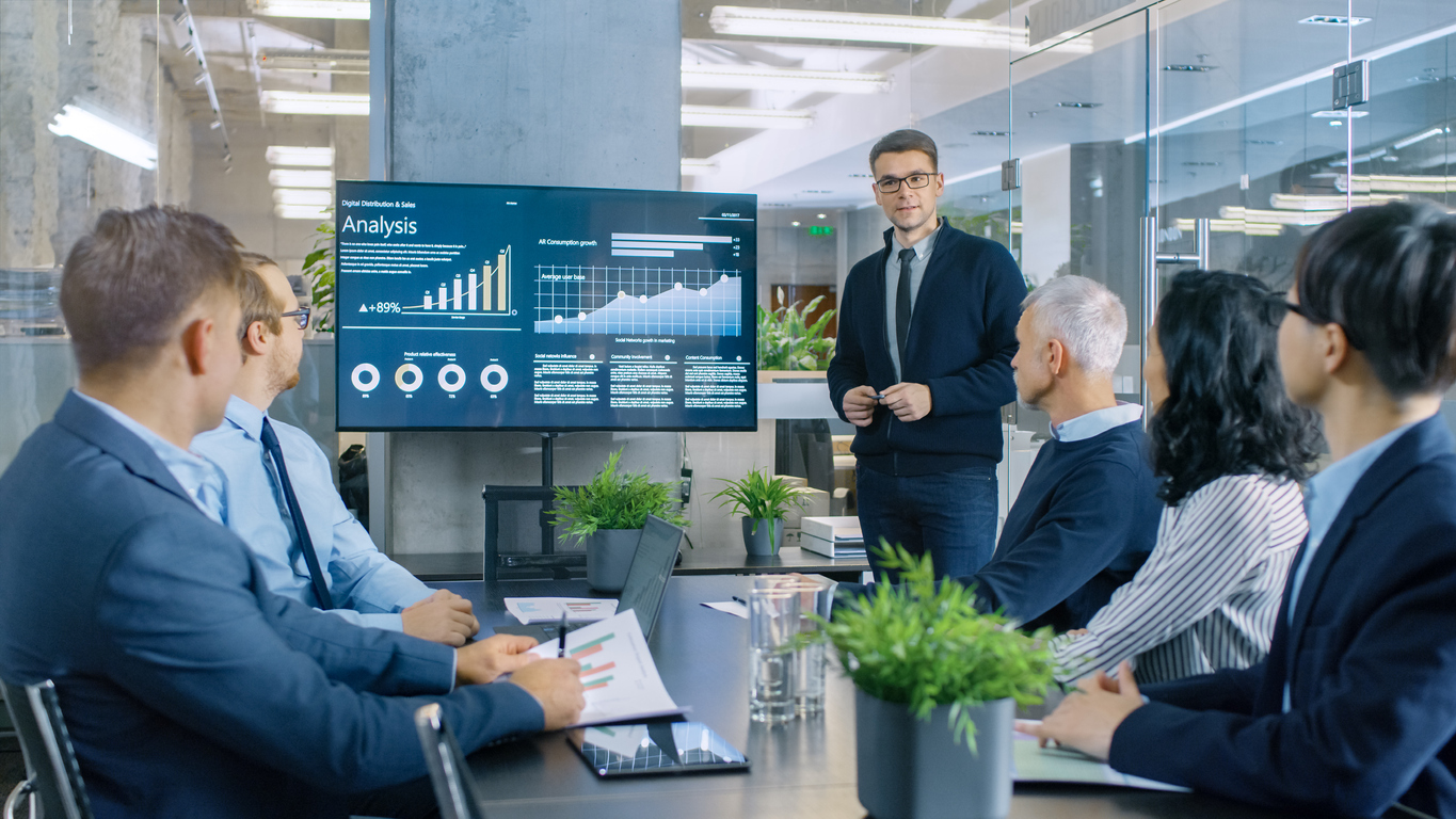 Financial transformation team viewing a presentation