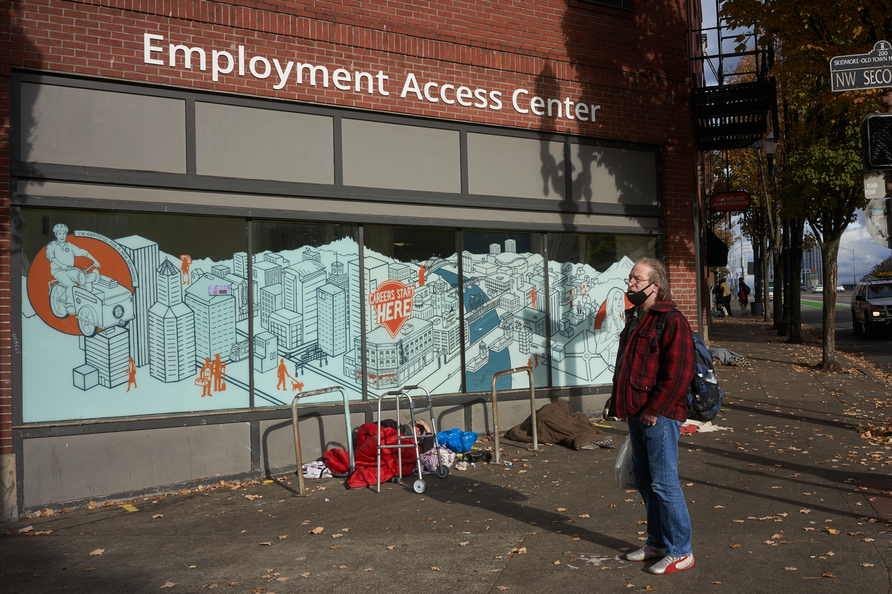 Man waiting outside Employment Access Center