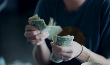 Person counting money