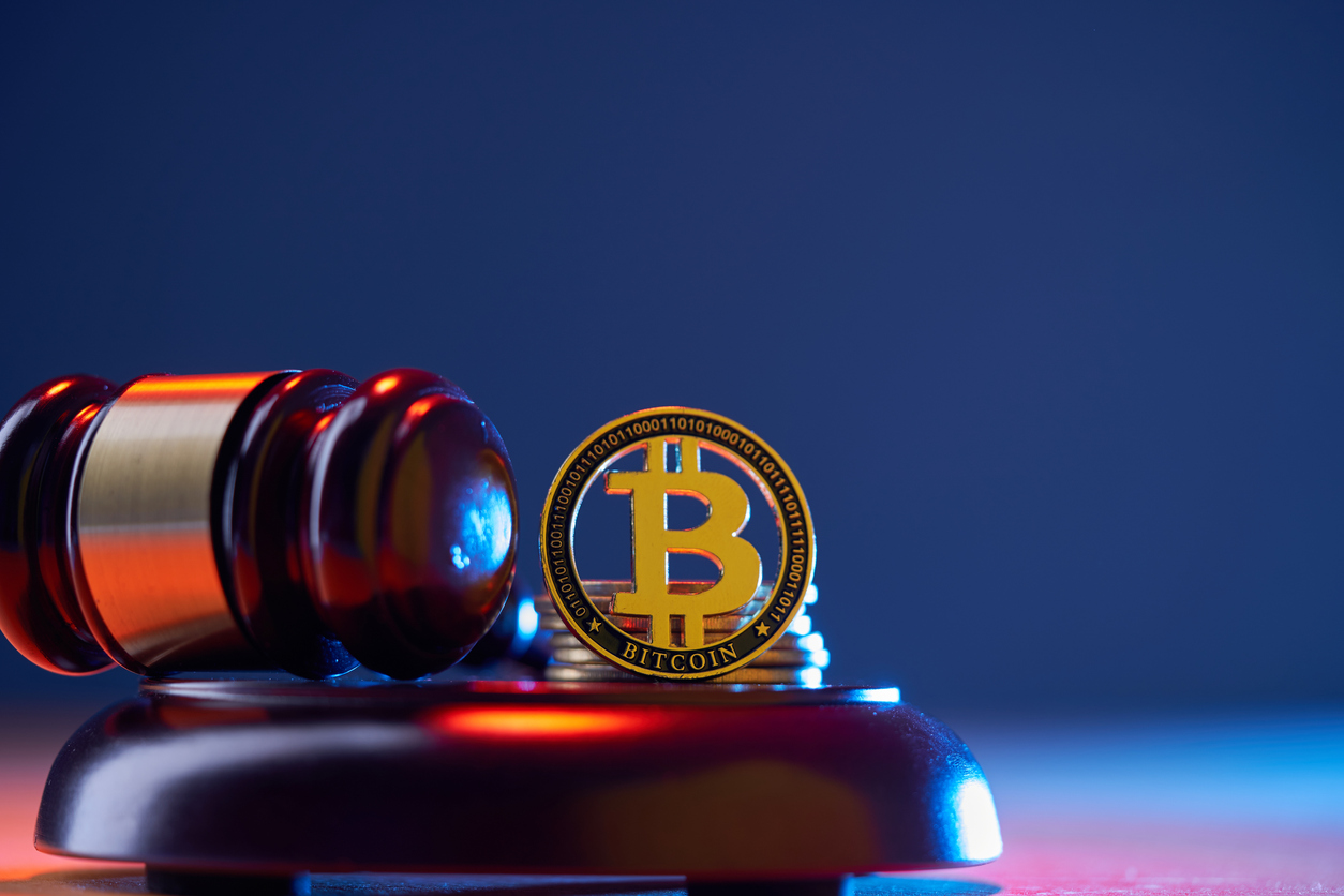 Bitcoin next to gavel; crypto crime