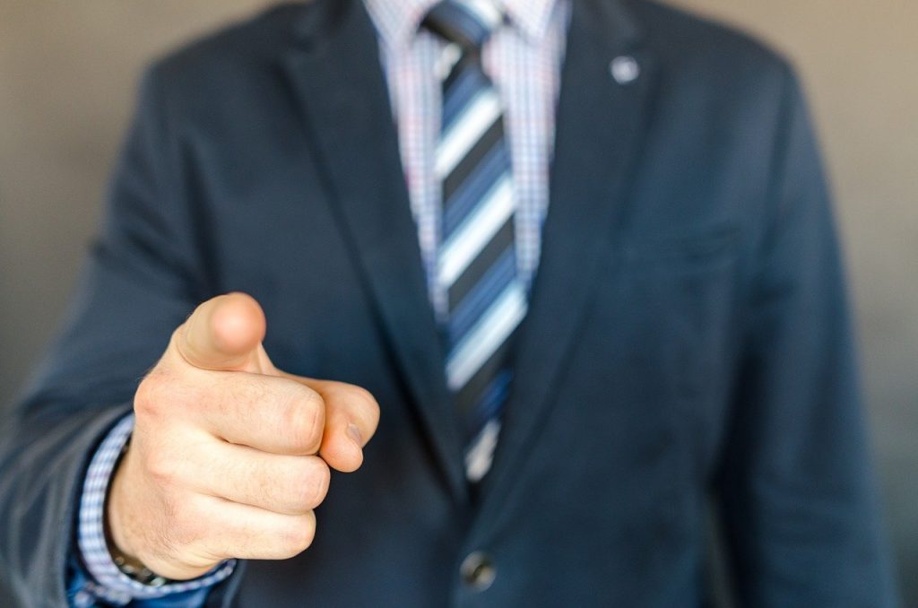 Businessman pointing finger