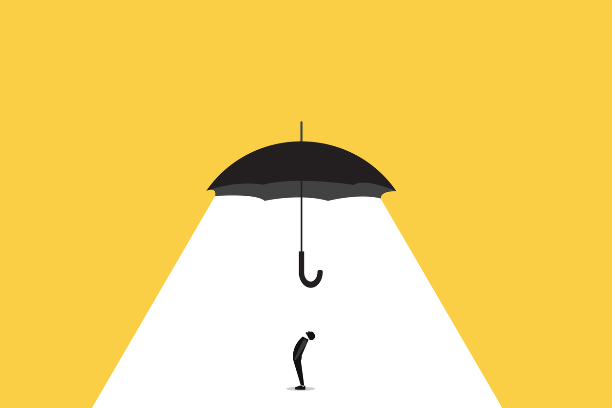 Business protection concept. businessman with umbrella. Symbol of insurance, care, and finance support