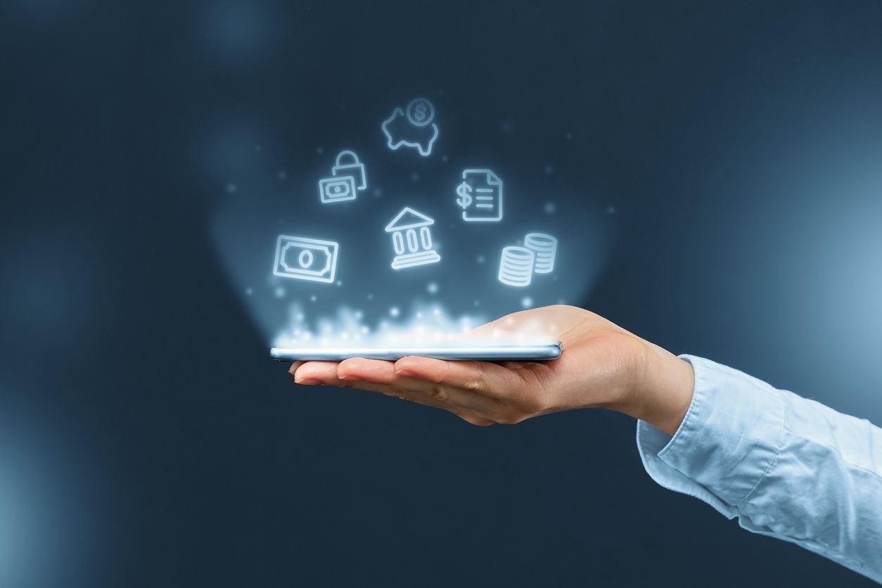 person holds a smartphone with mobile banking icons projection.