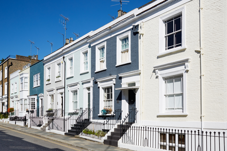 colorful english houses facades in a sunny day