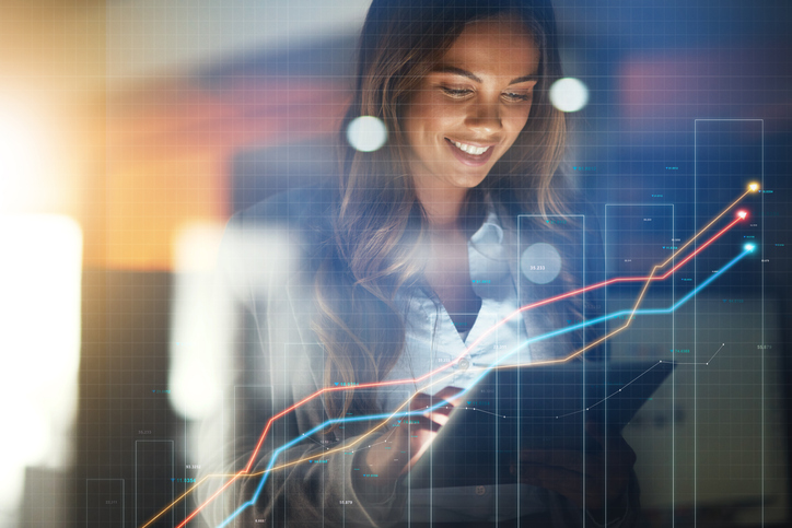 business woman, tablet and stock market in double exposure for trading profit, increase and data growth at night. happy trader, analyst or investor with finance graphs, arrow or statistics in overlay