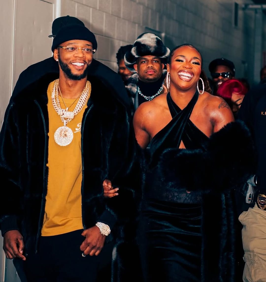Claressa Shields dressed glamorously, smiling and enjoying a night out on a date.