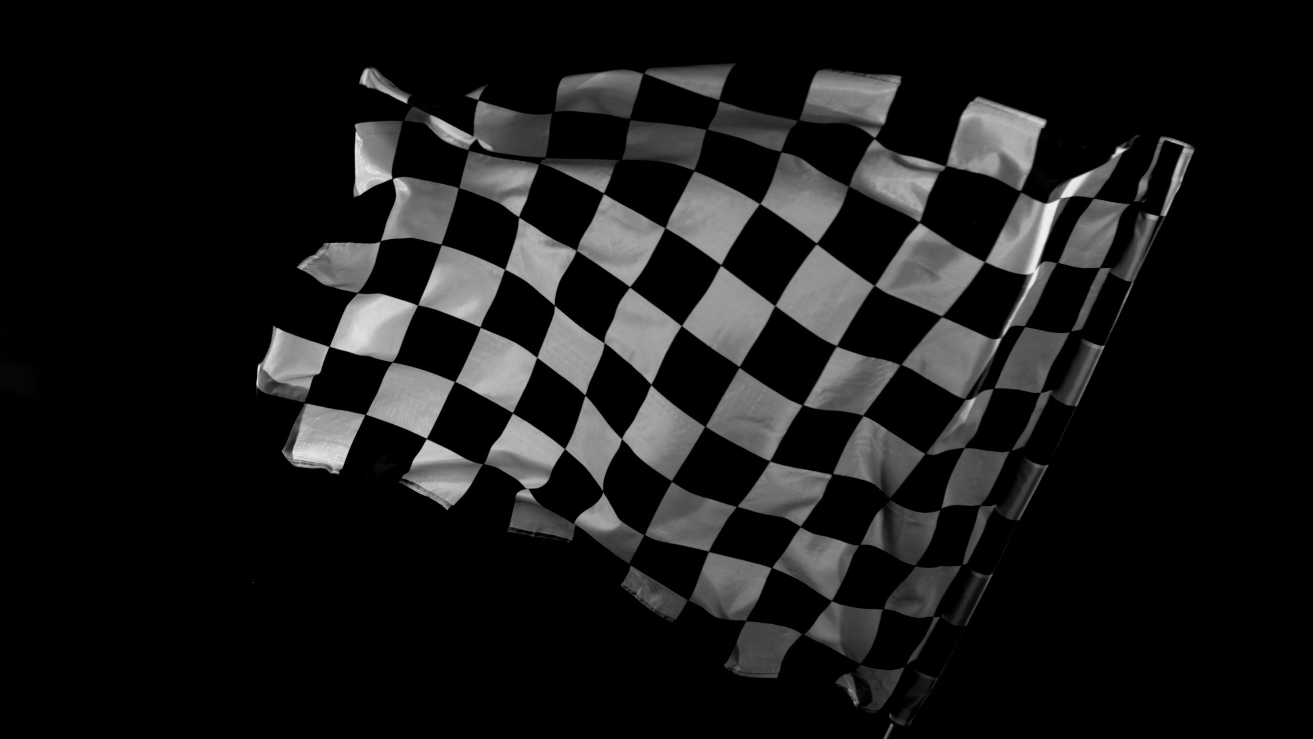 checkered,race,flag.,freeze,motion,wavy,closeup,fabric,fluttering,racing
