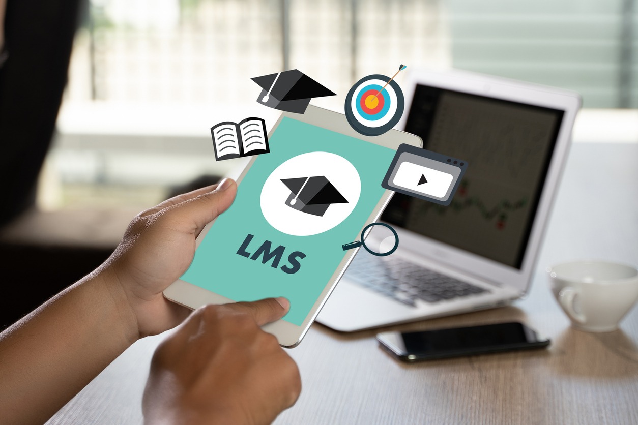 lms thoughtful male person looking to the digital tablet screen learning management system (lms) modern people doing business