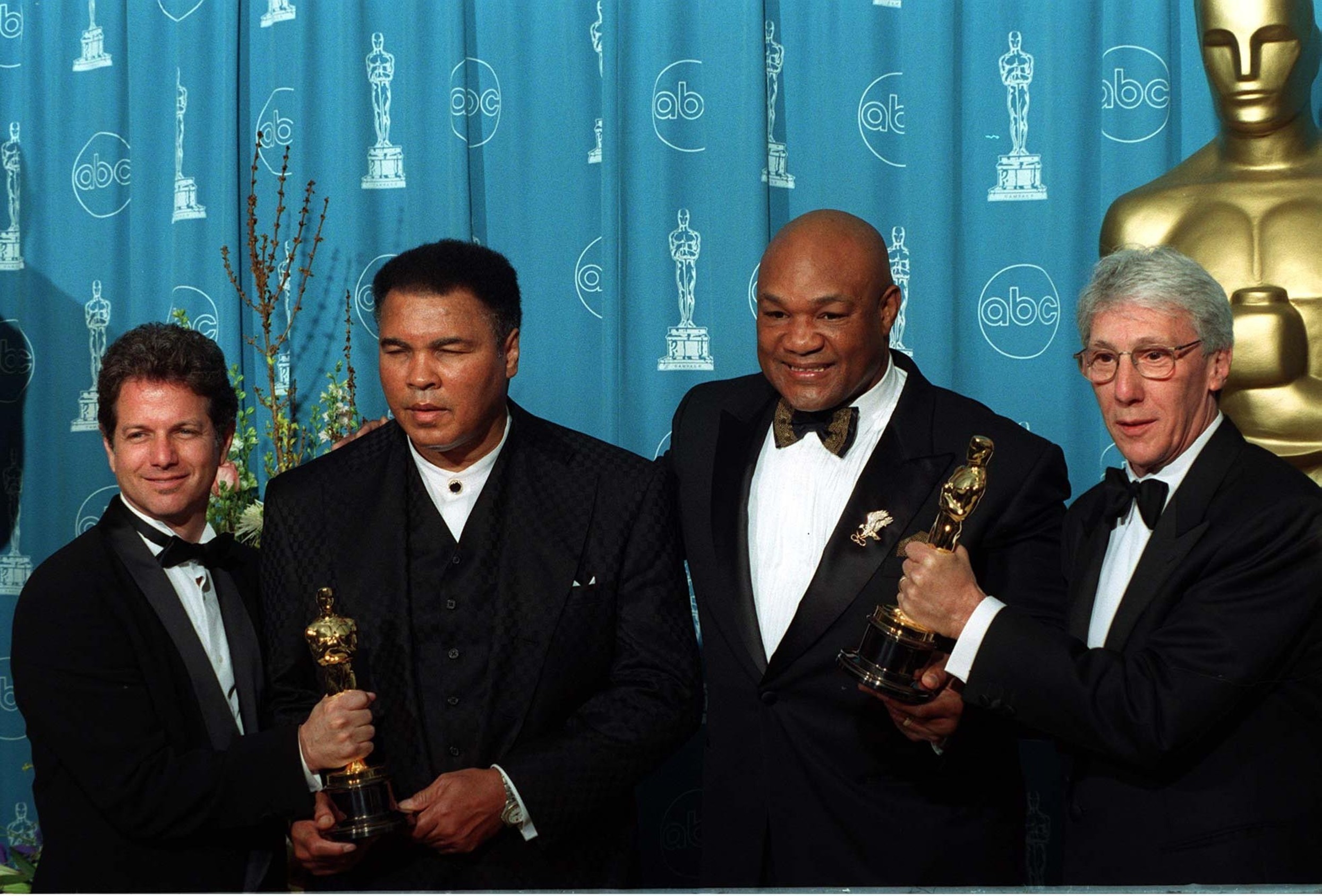24mar97:,muhammed,ali,(left),&,george,foreman,with,the,makers