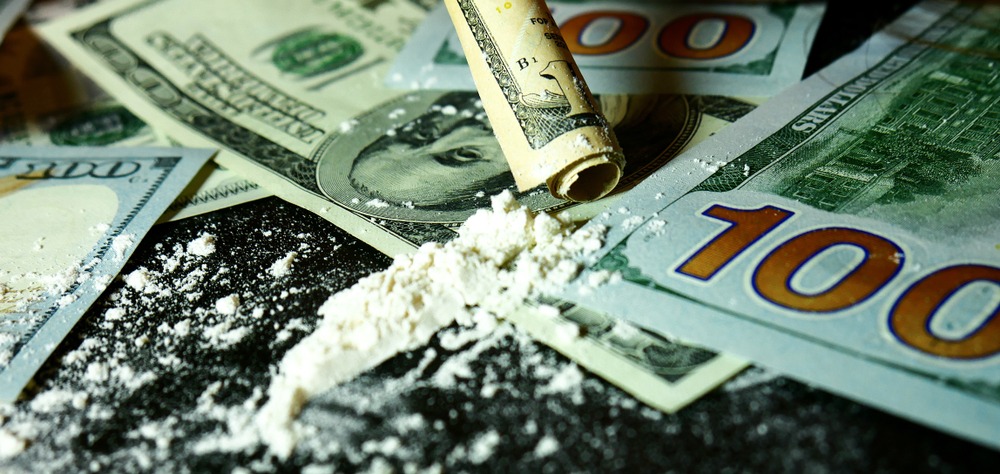 money,and,cocaine.,addiction.,drug,use.,hundred dollar,bills,,white,powder
