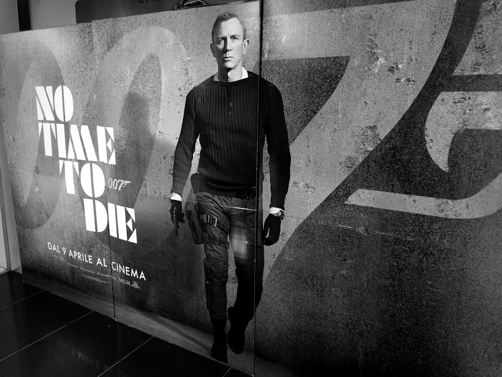 rome,,24,november,2021:,promotional,poster,in,a,roman,cinema