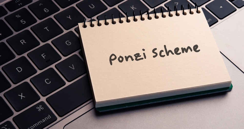 there,is,notebook,with,the,word,ponzi,scheme.it,is,as