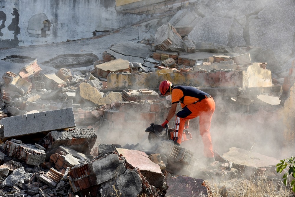 search,and,rescue,teams,are,working,in,the,wreckage, 