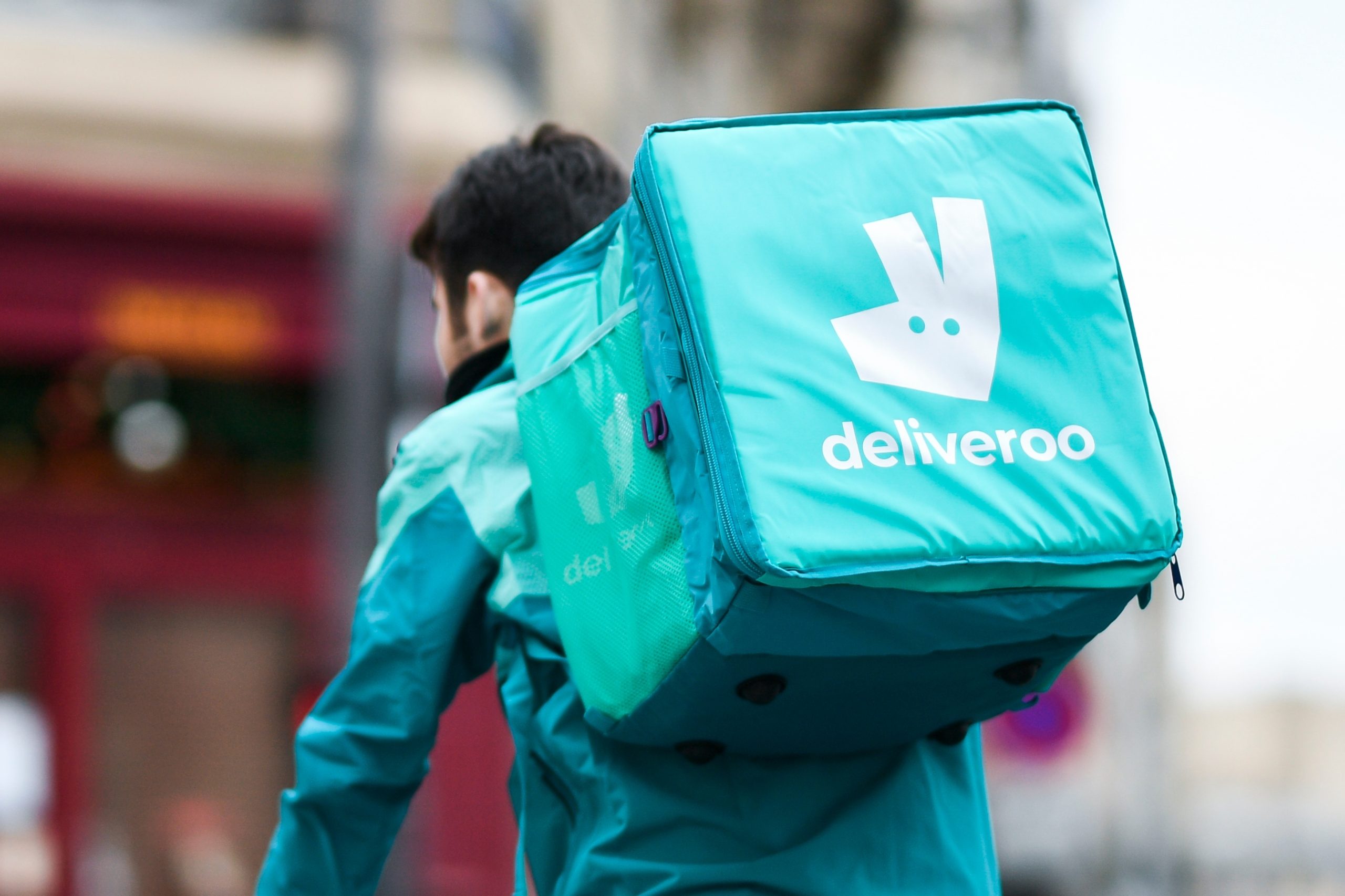 a,deliver,(man),for,deliveroo,on,his,bicycle,,in,paris,