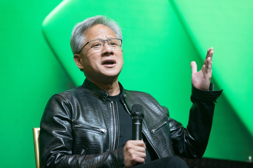 jensen,huang,nvidia's,founder,,president,and,ceo,gestures,during,a