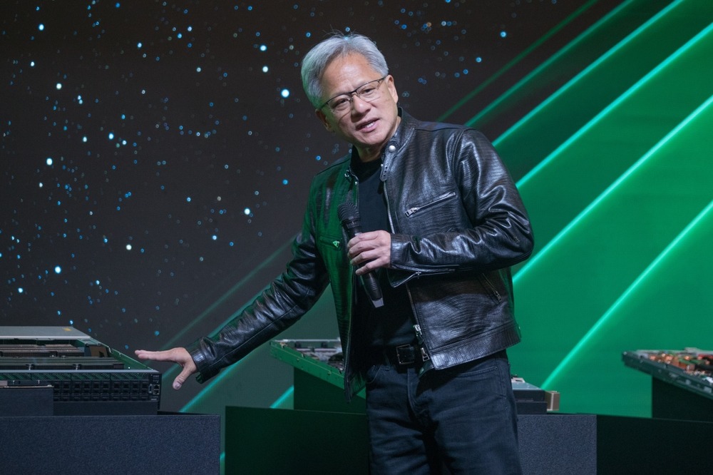 jensen,huang,nvidia's,founder,,president,and,ceo,gestures,during,a