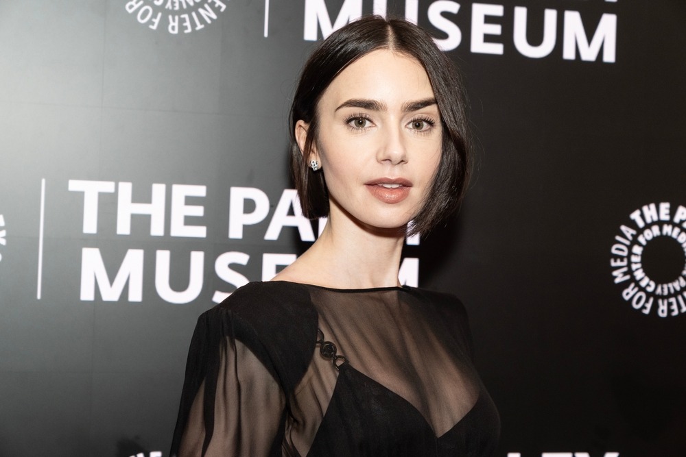 lily,collins,wearing,dress,and,shoes,by,versace,attends,paleylive