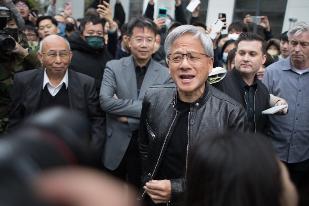 jensen,huang,,nvidia,founder,and,ceo,greets,with,his,fans