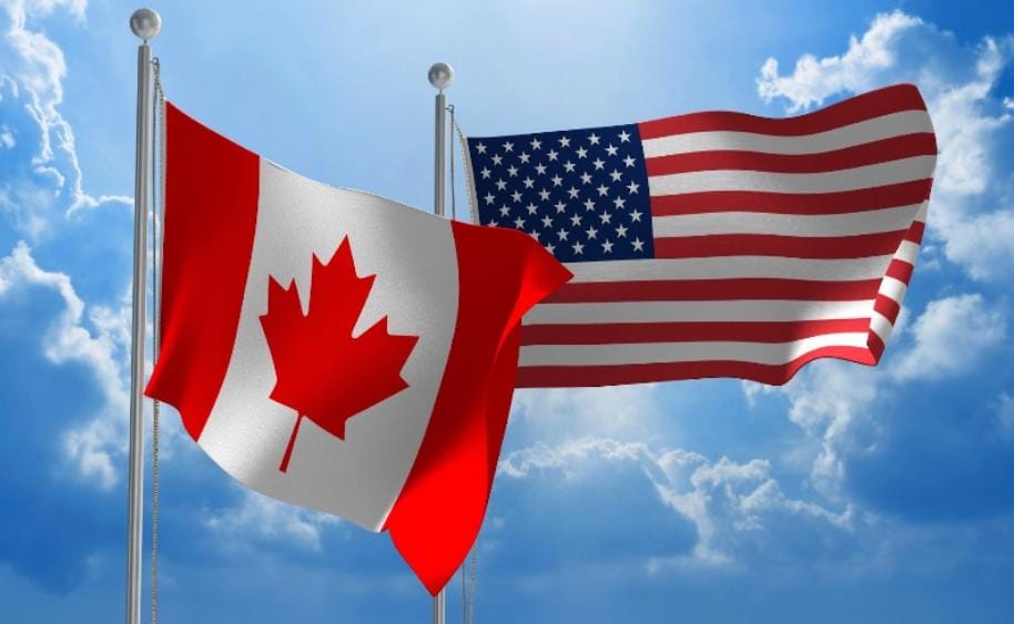 Canada and US flags together