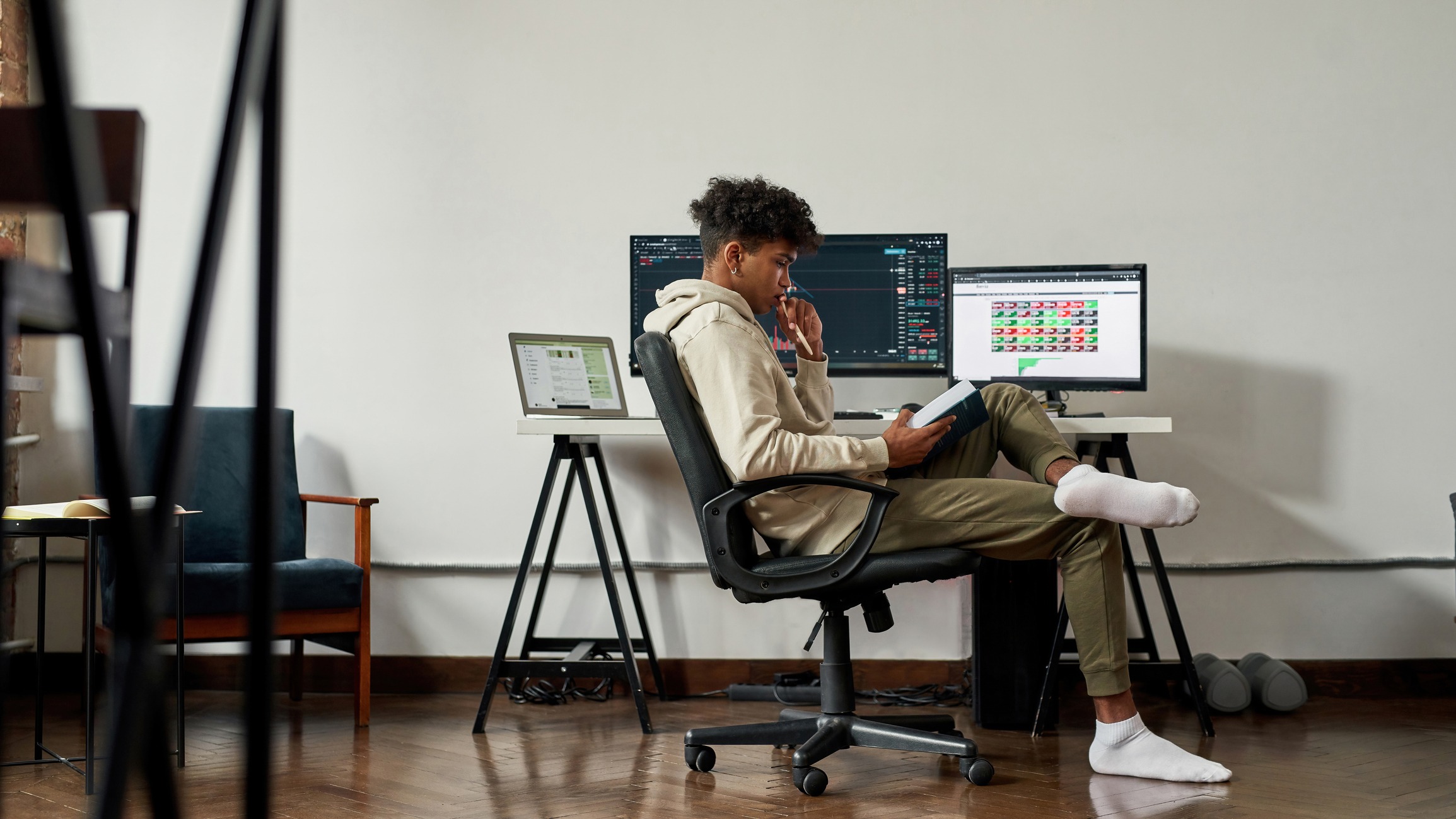 african american man expert trade online on computer while studying