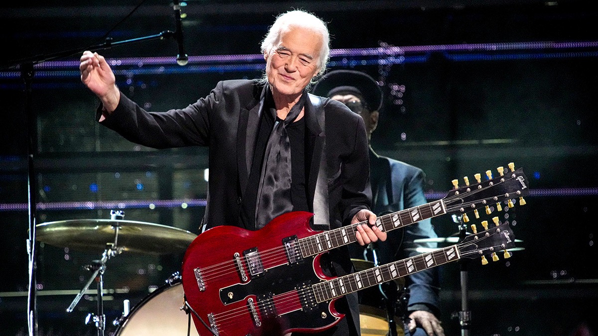 An older Jimmy Page playing a double-neck guitar on stage, showcasing his enduring skill and passion for rock music.
