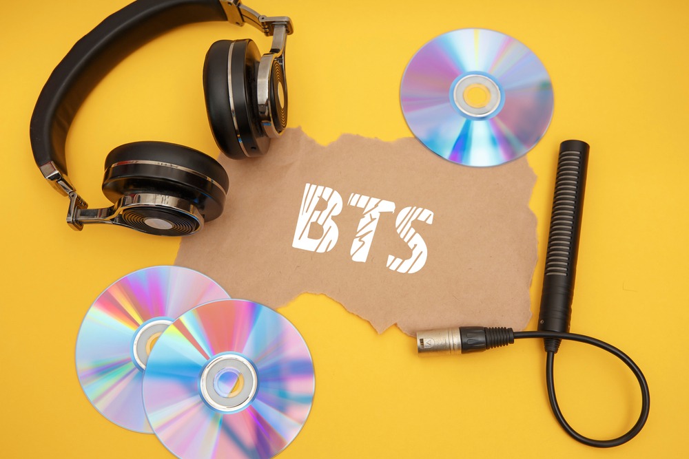 bts,concept,with,headphones,and,music,discs,on,a,yellow
