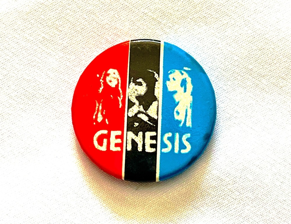 genesis,pin,button,on,a,cloth,background.,the,name,of