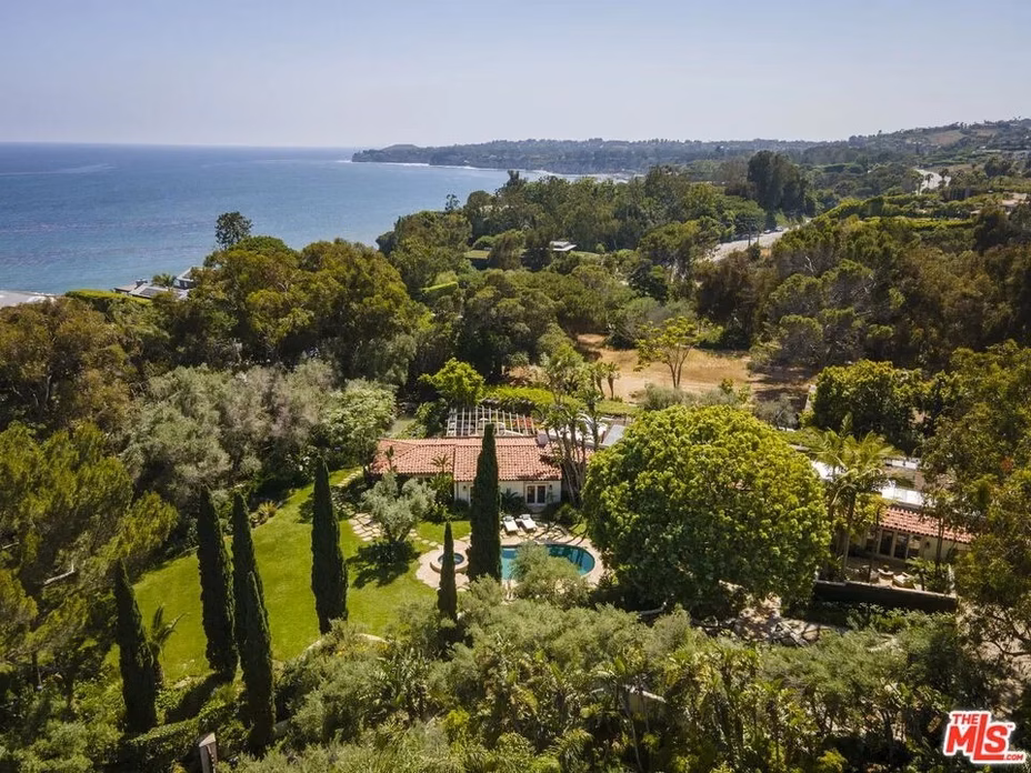 Aerial view of Tom Petty’s sprawling Mediterranean-style Malibu estate with ocean backdrop and lush grounds.