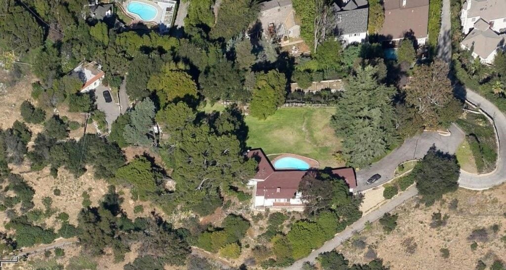 Aerial view of Joaquin Phoenix's Hollywood Hills home, showcasing its expansive grounds and proximity to adjacent properties.