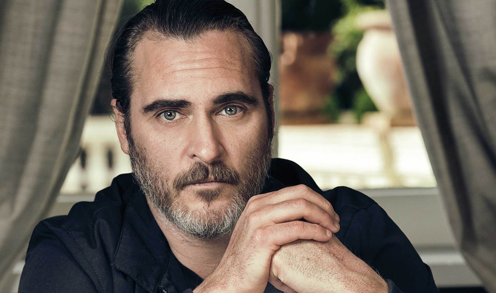 Joaquin Phoenix speaking passionately during an interview about veganism and animal rights.