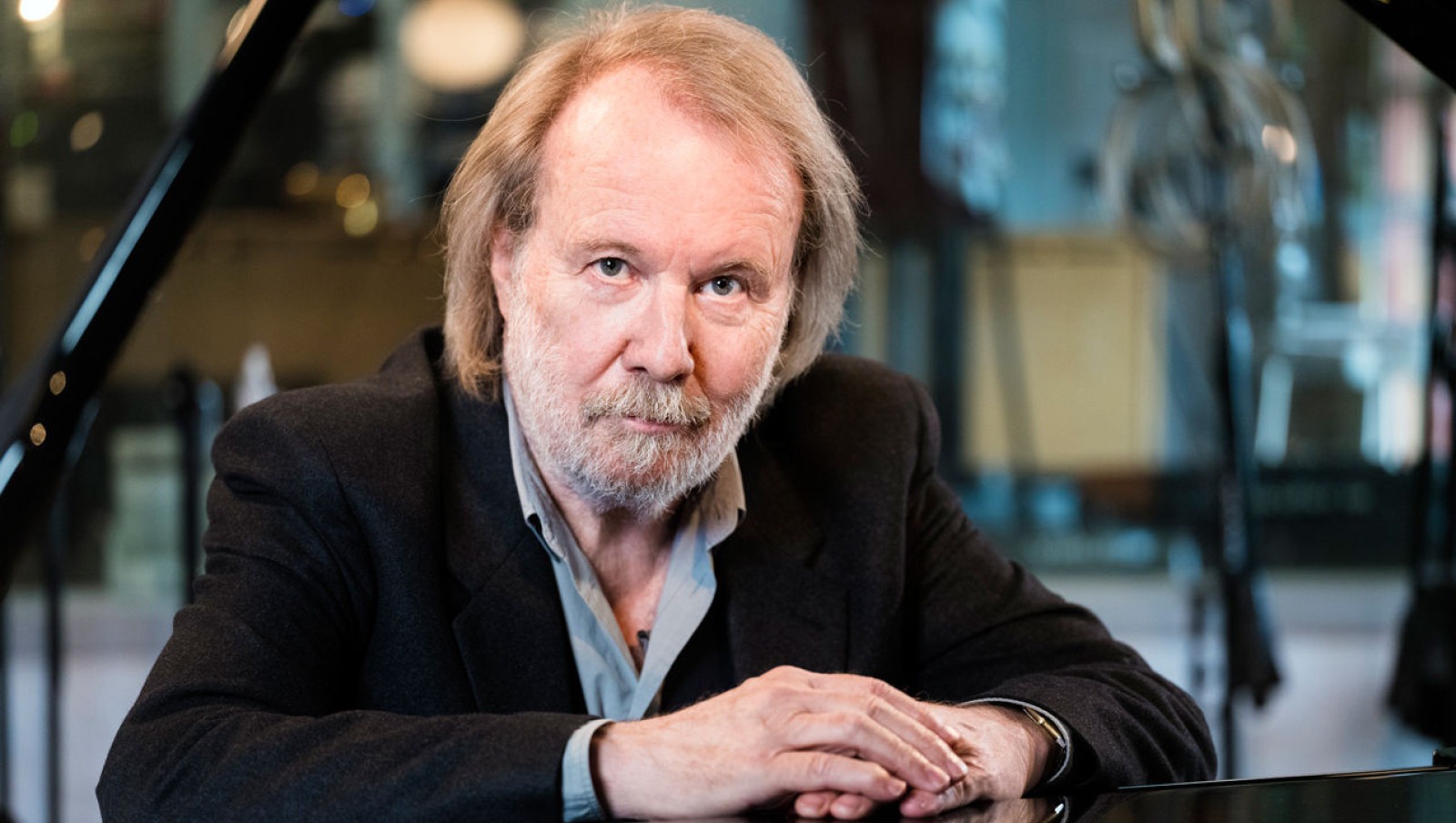 Benny Andersson looking thoughtfully into the camera during an interview.