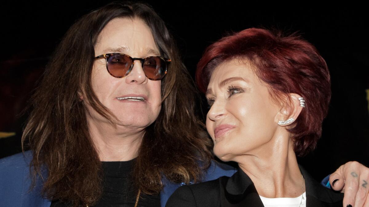 Sharon and Ozzy Osbourne sharing a moment before his death