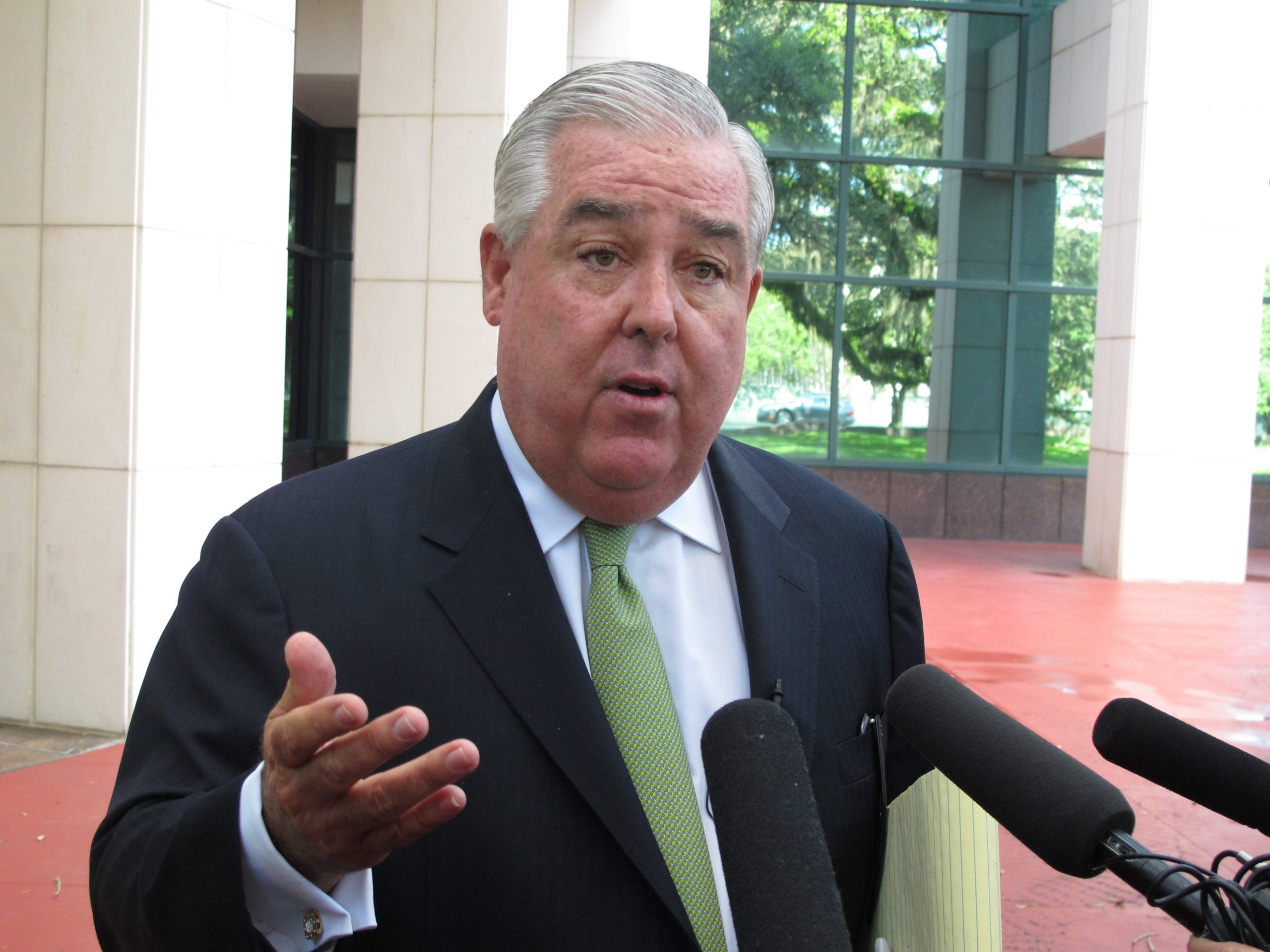 John Morgan responding to reporters' questions about a high-profile marijuana lawsuit.