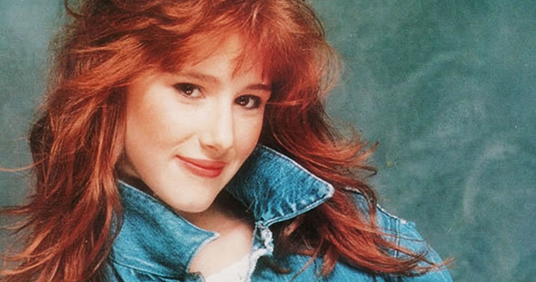 Tiffany performing live in the 1980s wearing iconic ’80s fashion