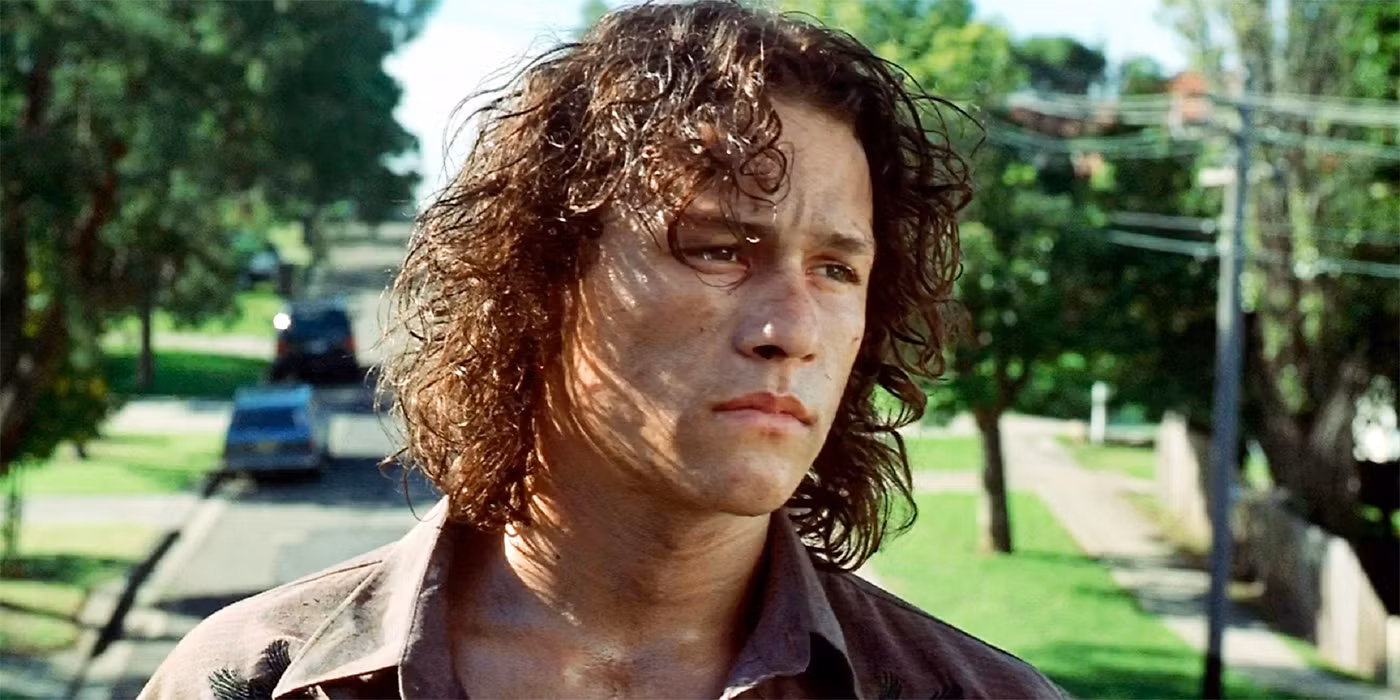 Heath Ledger looking downcast in an emotional scene from 10 Things I Hate About You.