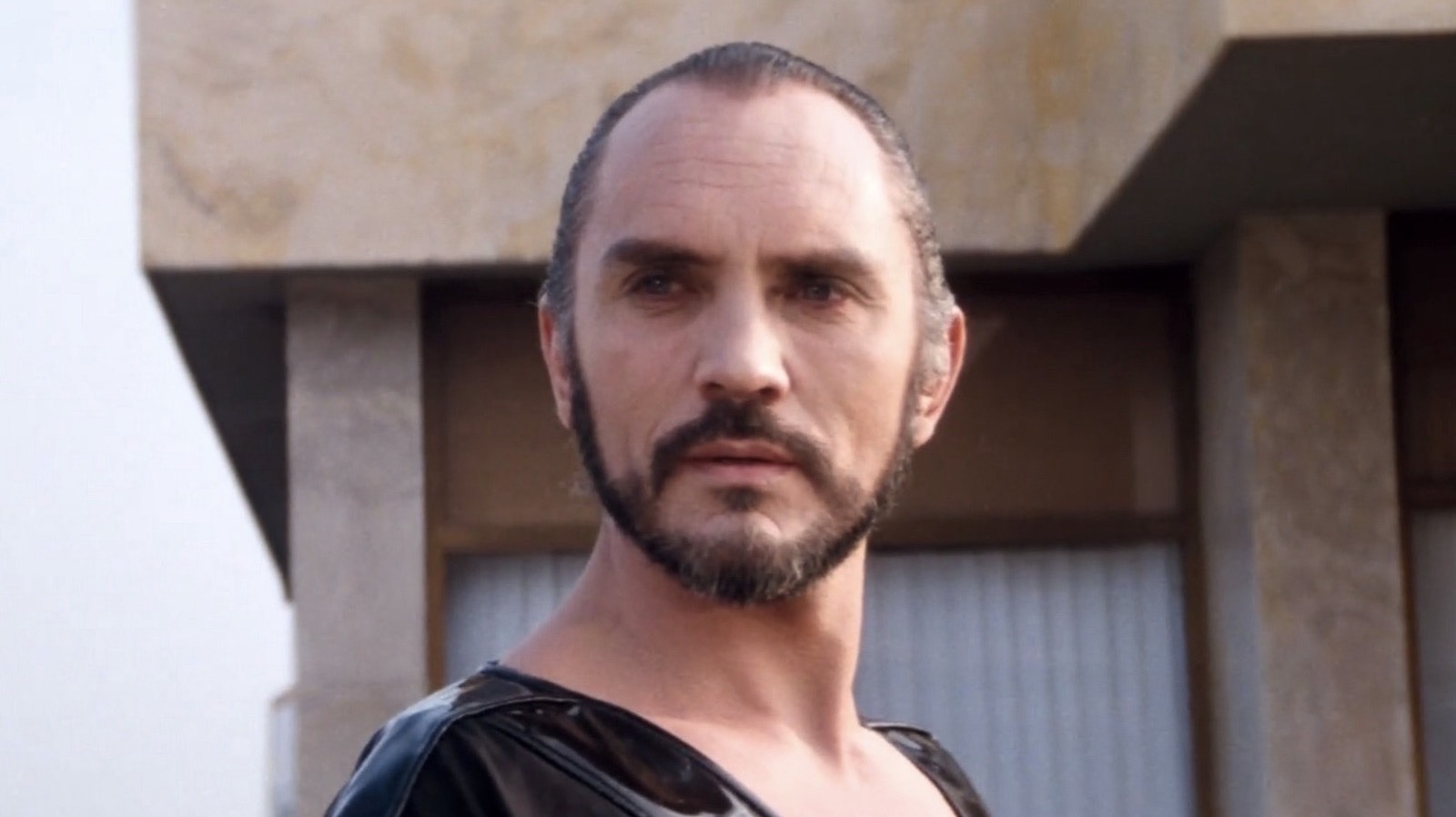 Terence Stamp as General Zod in Superman, wearing his iconic black Kryptonian armor.
