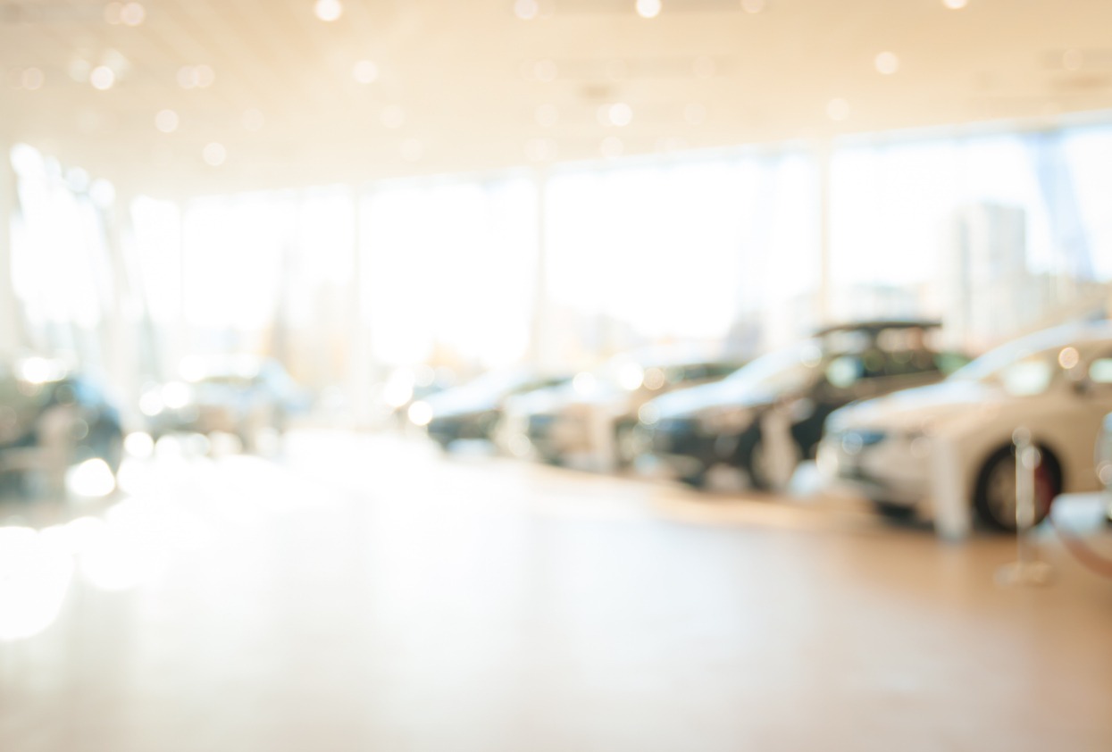 blurred new cars dealership place