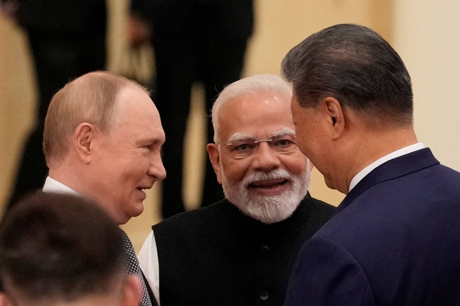 Indian Prime Minister Narendra Modi meeting Russian President Vladimir Putin and Chinese President Xi Jinping at the Shanghai Cooperation Organisation summit.