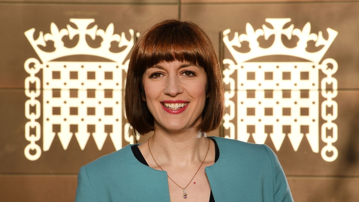 Bridget Phillipson smiling inside Parliament during a session.