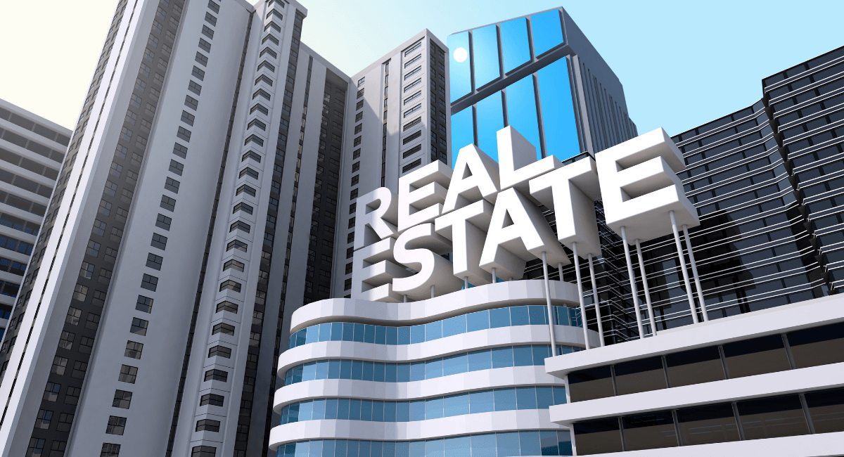 Modern high-rise buildings with the words “Real Estate” overlaid, representing commercial property investment and development.