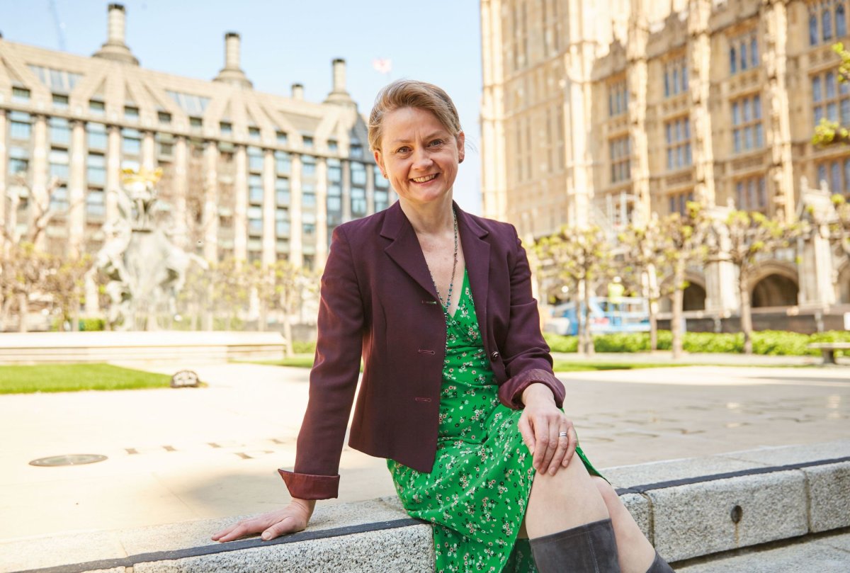 Yvette Cooper posing outside the Houses of Parliament in London.