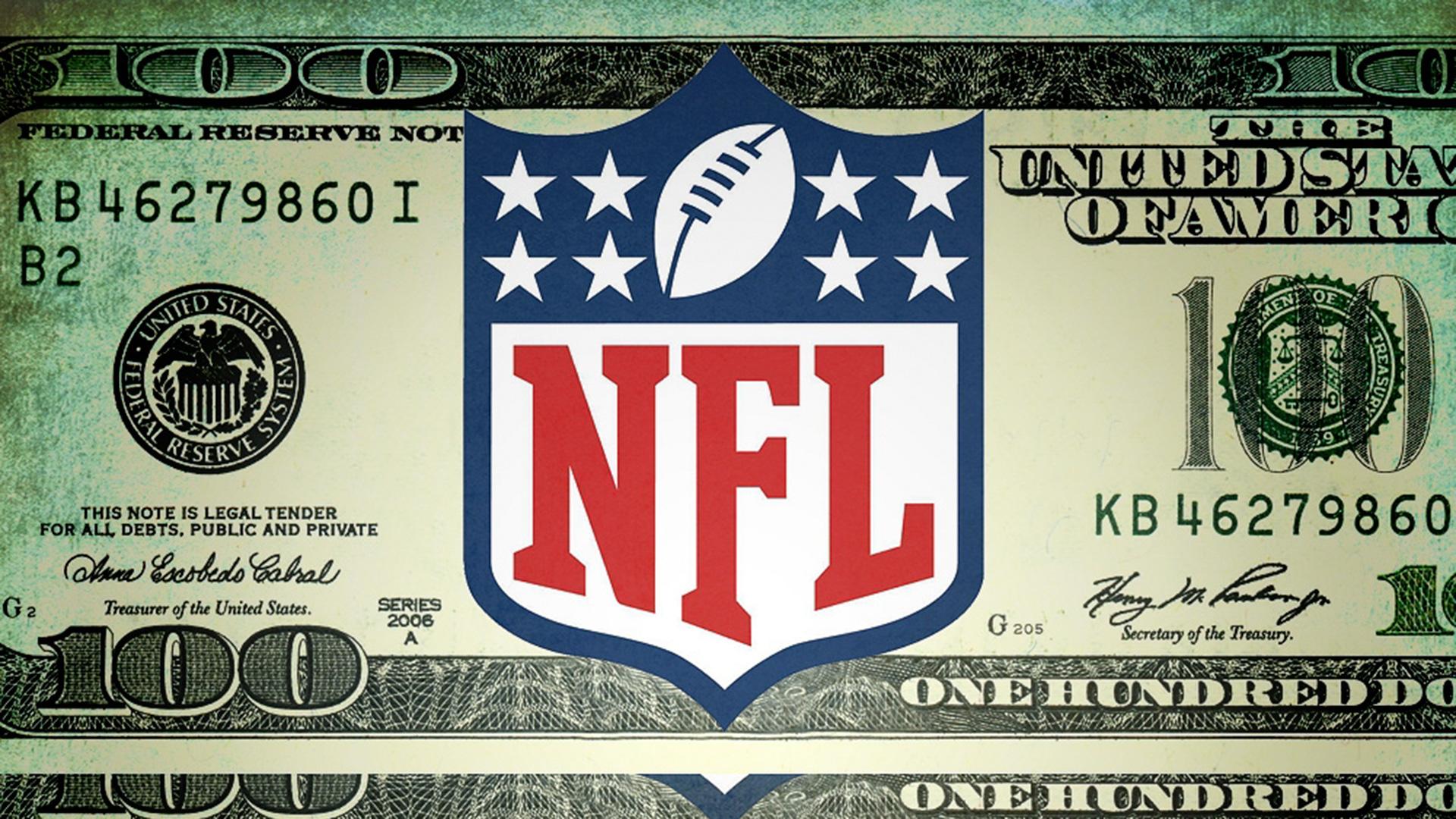 A close-up of the NFL shield logo superimposed on a U.S. dollar bill, representing the financial power of the league.