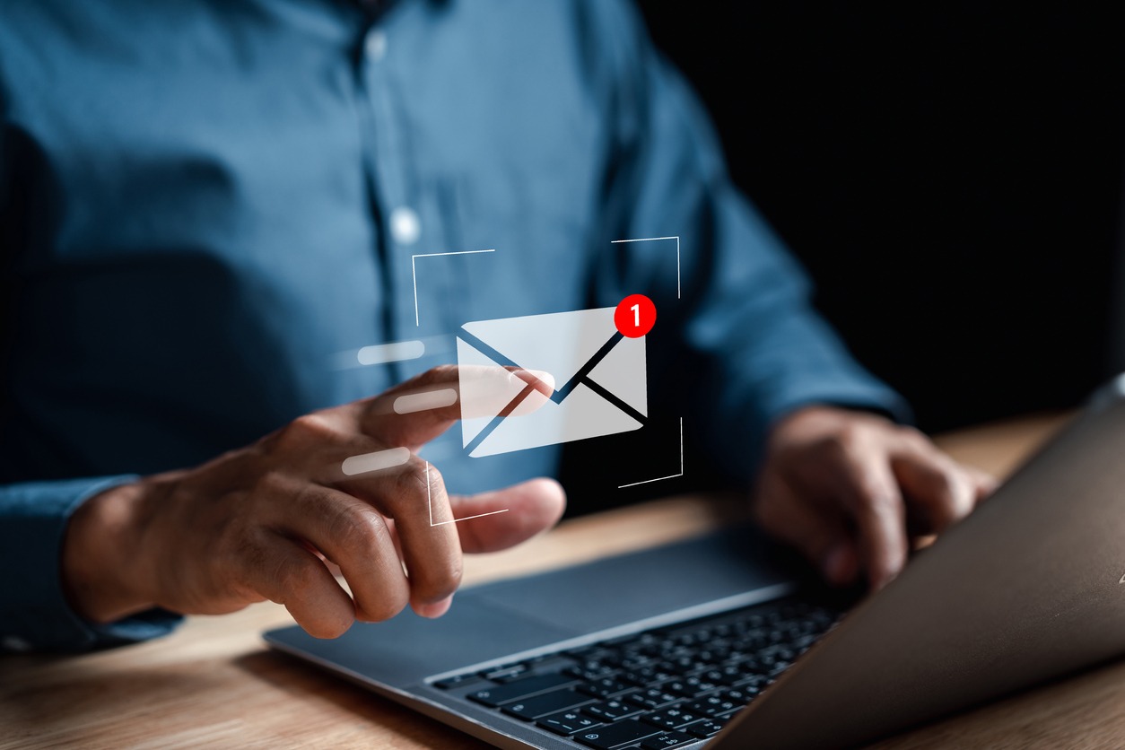 businessman sending email by laptop computer to customer, business contact and communication, email icon, email marketing concept, send e mail or newsletter, online working internet network.