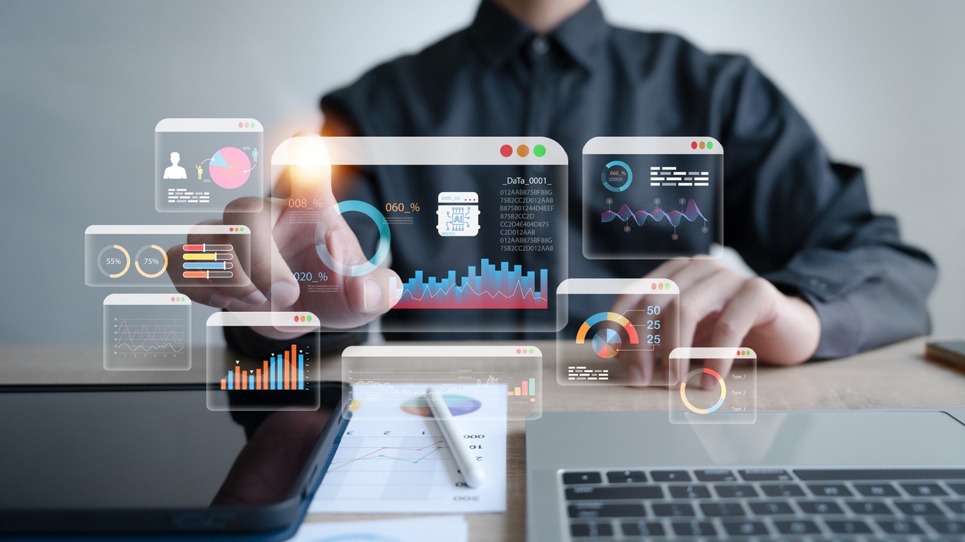 an analyst uses a computer and dashboard for data business analysis and data management system with kpi