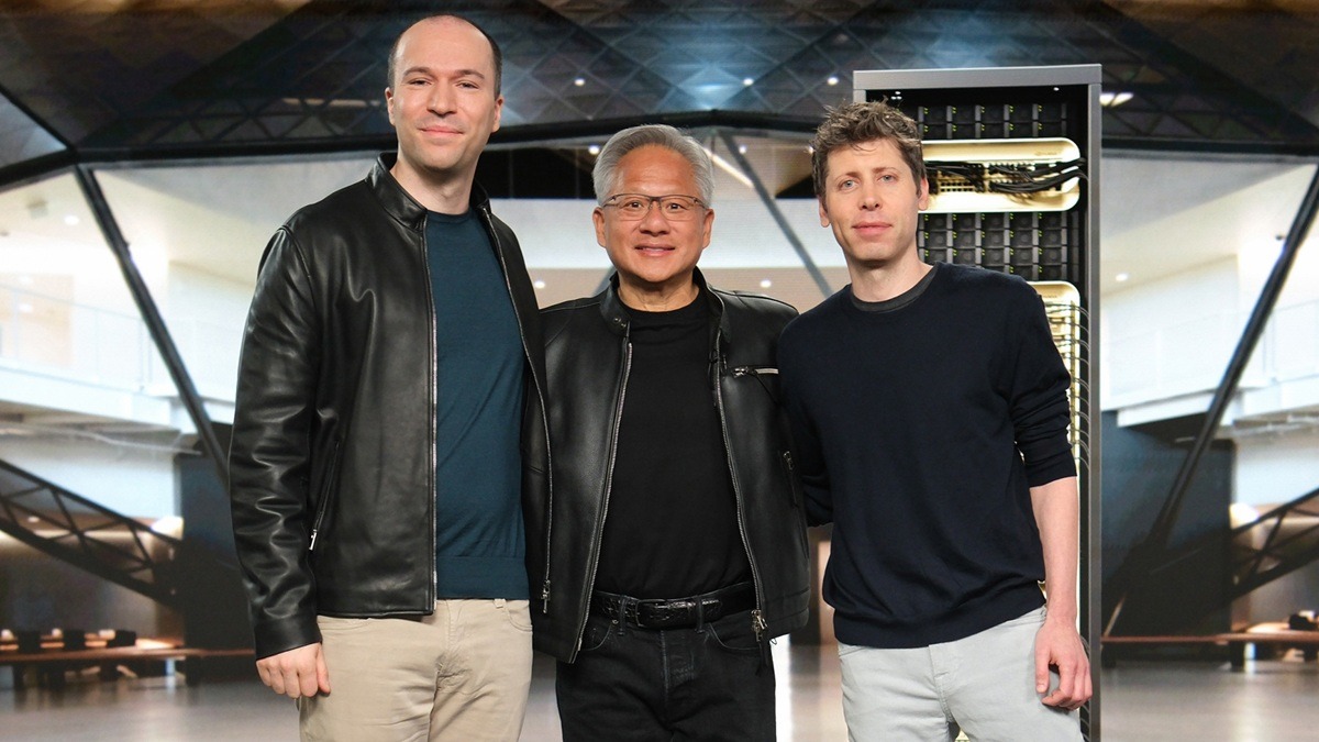 Greg Brockman and Sam Altman standing on either side of Nvidia CEO Jensen Huang, symbolizing the $100 billion OpenAI–Nvidia partnership.