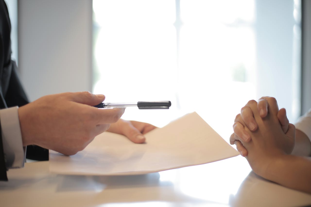 Man handing over a contract