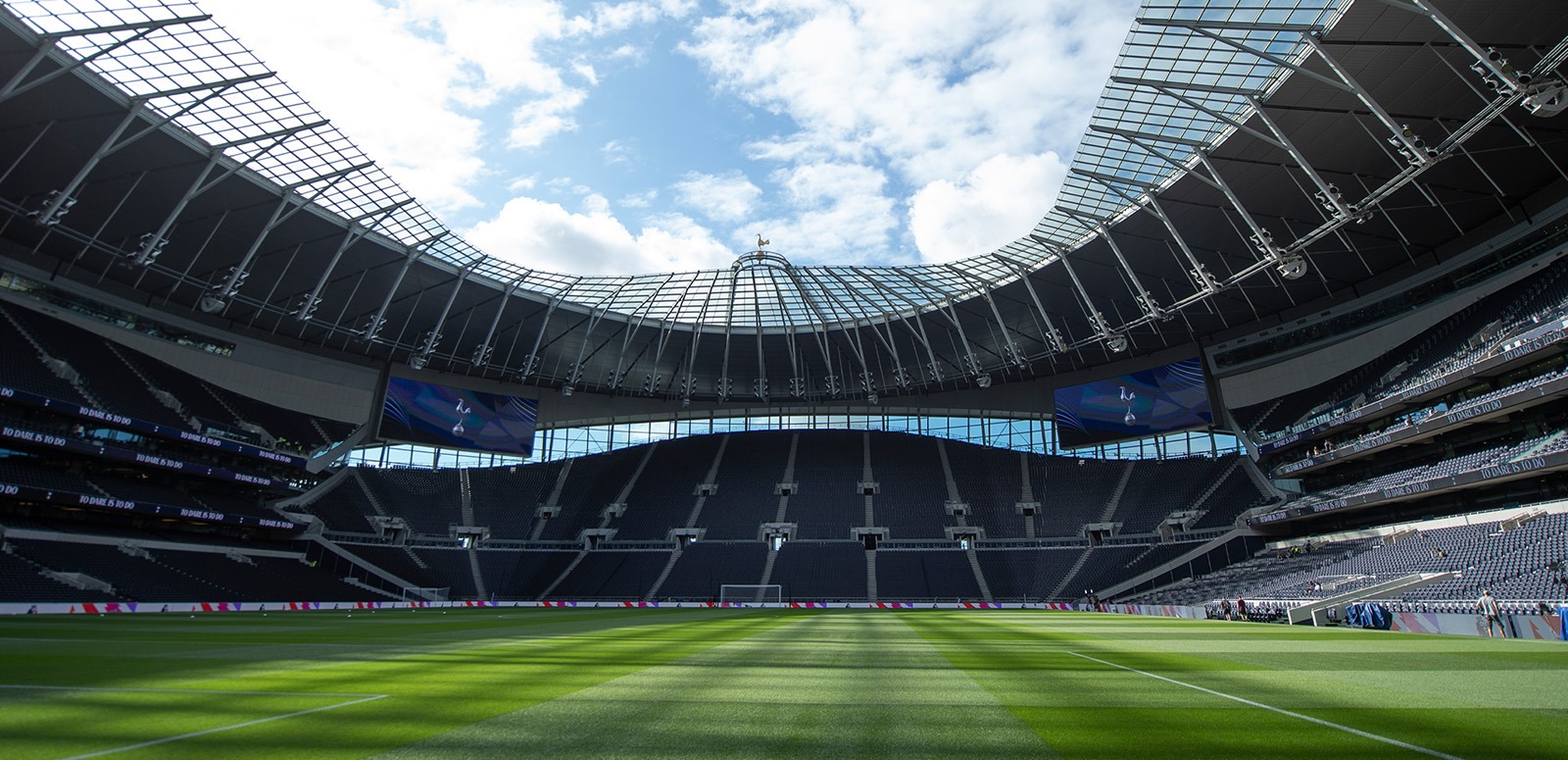 Tottenham Hotspur’s new stadium, Tottenham Hotspur Stadium, showcasing its modern architecture and large seating capacity.