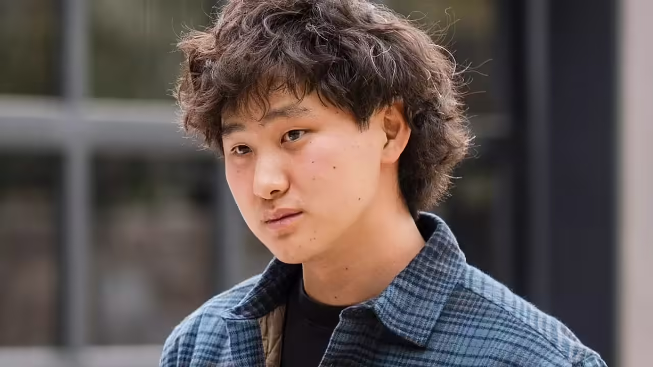 Alexandr Wang, the 28-year-old founder of Scale AI and Meta’s new head of Superintelligence Labs, photographed outdoors in a blue checkered jacket.