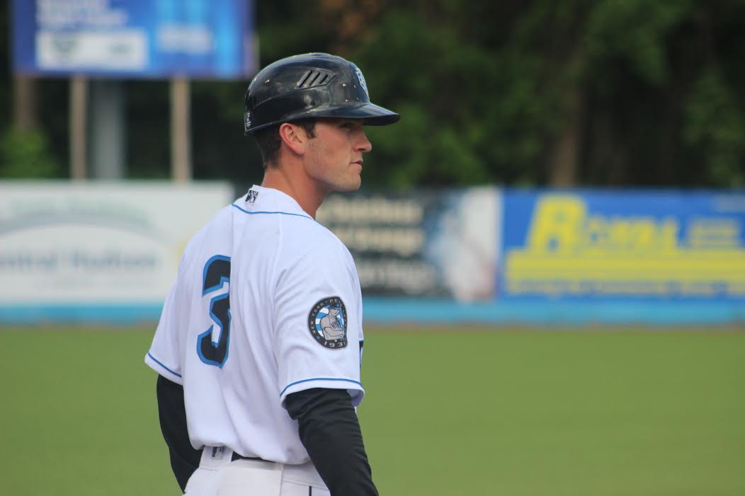Blake Butera on the baseball field wearing a white and black uniform